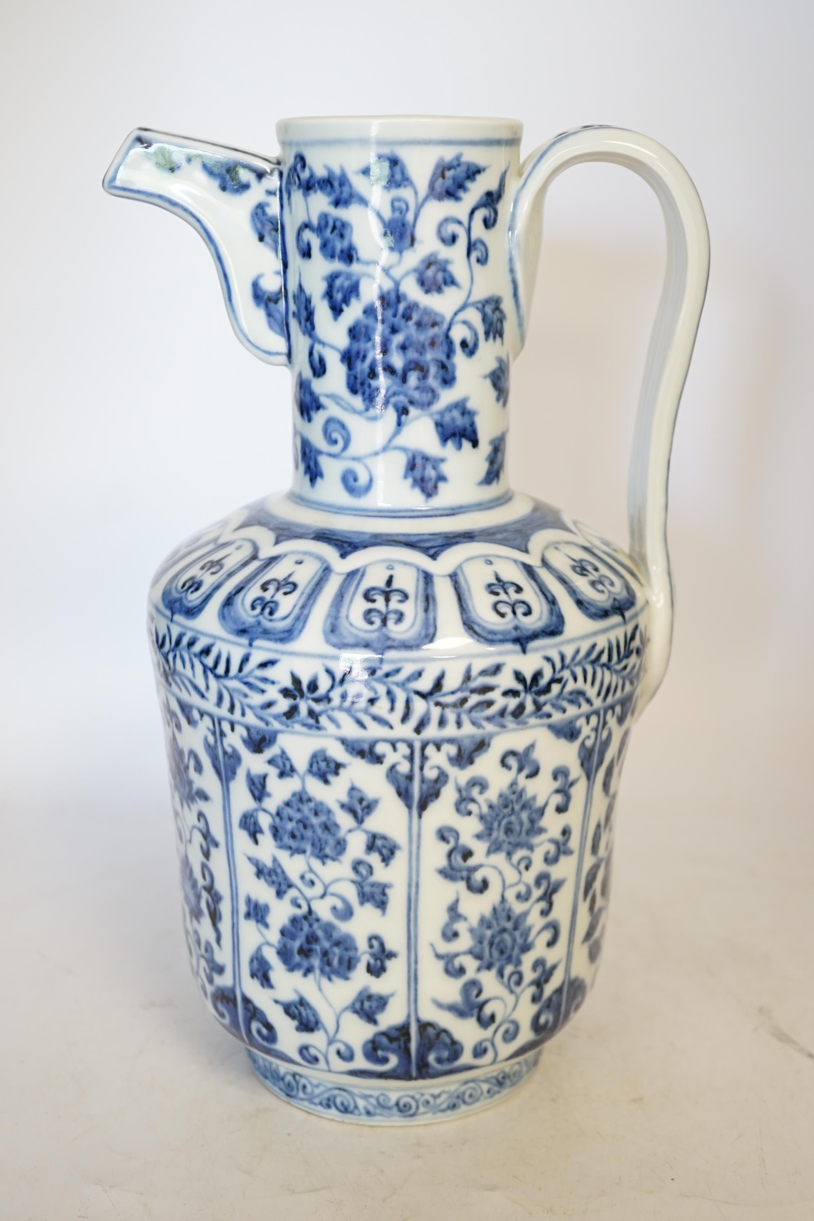 A Chinese blue and white monk’s cap ewer, 34cm high. Condition - good